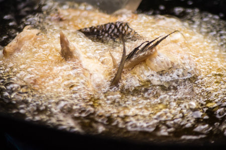 fish fryingの写真素材