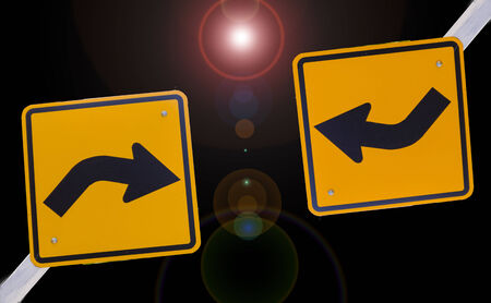 Traffic signs on the road by the wayの写真素材