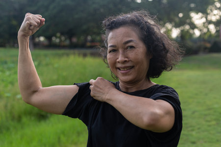 woman doing exercises on green nature.