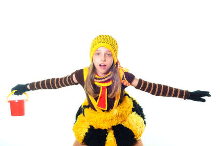 happy little girl in bee dressの写真素材