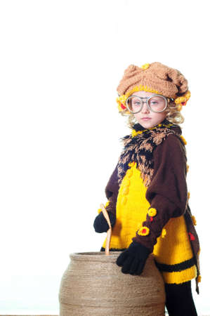 The little girl in a suit of the cook near flanksの写真素材