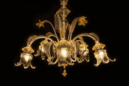 Beautiful chandelier (from Murano Italy) isolated on black background. Murano chandelier glass lighting is made by master glass blowers.の写真素材