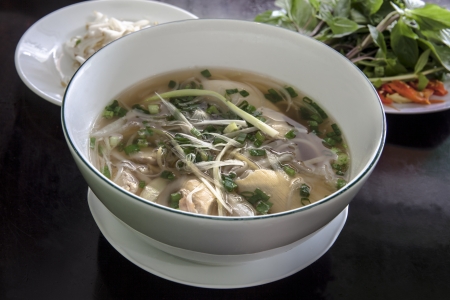 Pho Vietnamese Rice Noodle Soup  Pho is a Vietnamese noodle soup consisting of broth, rice noodles, a few herbs, and meat It is a popular street dish in Vietnam and around the world  の写真素材