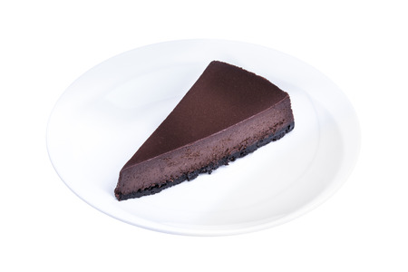 Delicious chocolate cake in white plate, isolated with clipping paths の写真素材