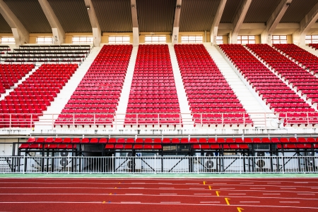 Stadium with red seats and red running track  The National Stadium of Thailand or Suphachalasai Stadium, Bangkok のeditorial素材