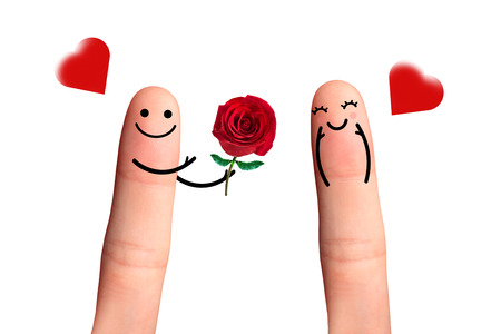 Cute couple in love with smiley, Giving a rose, isolated in white の写真素材