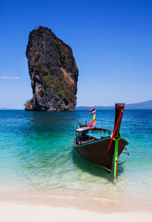 Boat on the beach at Phuket Island, Tourist attraction in Thailand  - Phuket is an international magnet for beach lovers and serious divers in the Andaman Sea  の写真素材