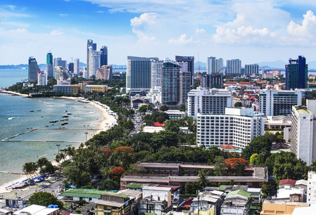 Urban city Skyline, Pattaya bay and beach, Thailand  - Pattaya is a most popular beach resort with tourists and expatriates  It is located on the east coast of the Gulf of Thailand, southeast of Bangkok in the province of Chonburi の写真素材