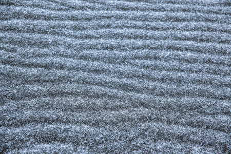 Snow and ice sand beach abstract pattern background - Jokulsarlon and the ice beach, Iceland