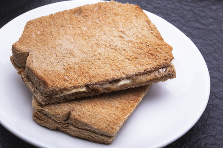 Kaya Toast Asia Snack on the white dish and table. - Kaya is coconut jam and is a well-known snack in Singapore  Malaysiaの写真素材