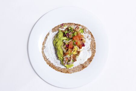 Taco steps 5: lettuce and tomatoeの写真素材