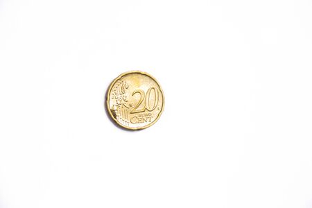 Single golden 20cent Euro coinの写真素材