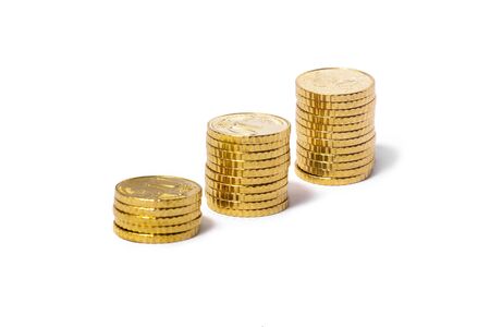 Golden Cents, Euros, stocked in 3 piles separated. Front Front perspectiveの写真素材