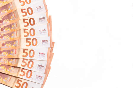 stacked up 50 euros Bills with coinsの写真素材