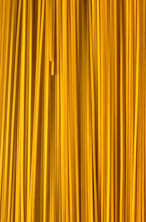 Beautiful studio shot raw pasta with laurel leaves. high end advertising photosの写真素材