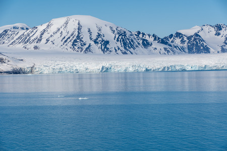 Svalbard, Norway 06.20.2018: The north Pole -Arctic Landscaper with Ice, Iceberg, Mountains in a clear blue ocean and skyの写真素材