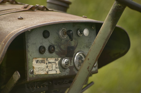 Instrument panel and speedometer of an old vintage tractor used for working on a farm.の写真素材