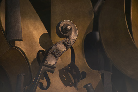 Macro detail of some pieces of vintage violins, a set of pieces of old violins placed in such a way as to create a pleasant composition.の写真素材