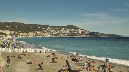 Seaside resort on Nice beach in France during summer time. A breathtaking landscape.のeditorial素材