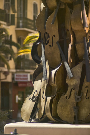 Craft sculpture made with violin parts shot vertically, sculpture is located in Nice.の写真素材