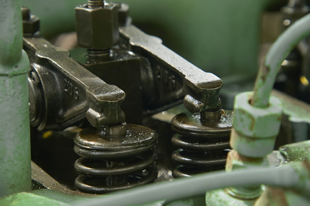 Detail of the suction and discharge valves of a Diesel engine while disassembled for repairs and maintenance.の写真素材