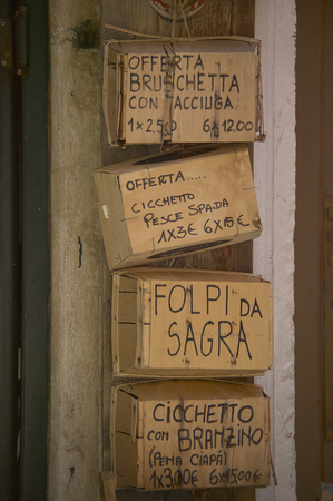 Wooden baskets used as insignia in a typical Italian hamlet: here you live as once respecting the ancient traditions.の写真素材