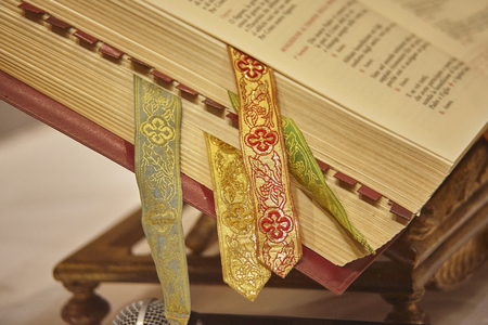 Missal with various bookmarks used as a book for the readings during the celebrations of the Masses in the Catholic Relicion.の写真素材