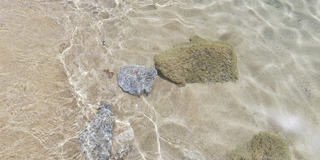 Rocks under the transparent and crystalline water of the Caribbean sea.の写真素材