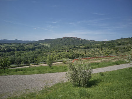 Hilly landscape rich in vegetation typical of the areas of central Italy.の写真素材