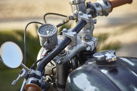 Incredible Level of detail of the tank and handlebar parts with a vintage motorcycle odometer.の写真素材