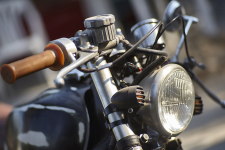Detail of the handlebars and the front of an old ruined and corroded bike with many years of experienceの写真素材
