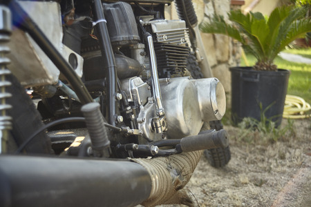 Detail of the complete mechanics of the engine of an old street bike, polished and cleaned to give it new life.の写真素材