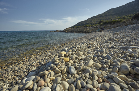 Magnificent view of Punta Molentis beach In Sardinia, taken during the summer: A completely uncontaminated and natural Mediterranean pebble beach.の写真素材