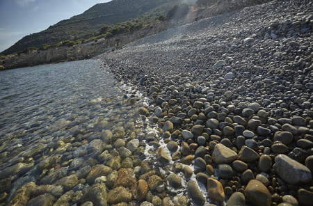 Magnificent view of Punta Molentis beach In Sardinia, taken during the summer: A completely uncontaminated and natural Mediterranean pebble beach.の写真素材