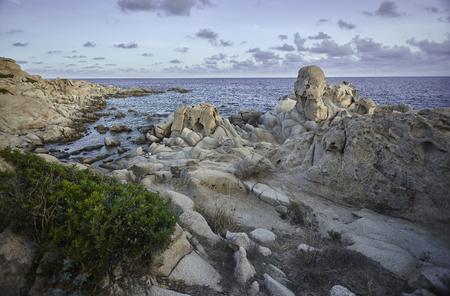Seascape of a portion of the southern coast of Sardinia with its granite rock formations typical of the area.の写真素材