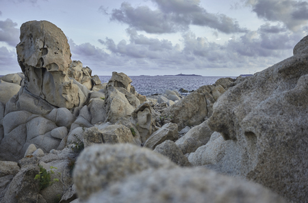 Beautiful cliff on the southern coast of Sardinia, formed by granite rock shaped by the sea and the elements.の写真素材