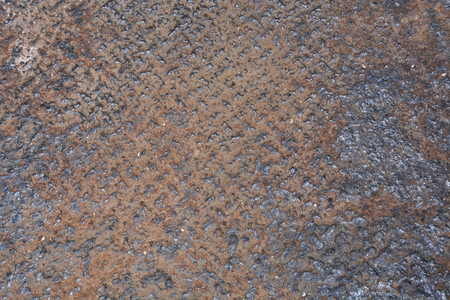 Texture of a knurled metal surface in an evident state of corrosionの写真素材