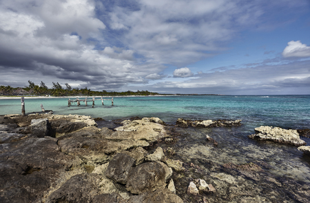 View of the Xpu-Ha beach in the Mayan Riviera in Mexico, on a cloudy day: A magnificent panorama typical of Caribbean beaches.の写真素材