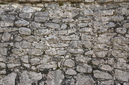 Texture of natural stones forming a wall.の写真素材