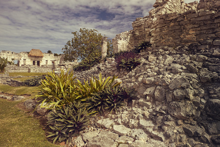 Detail of the architecture of the Mayan temples belonging to the ruins of Tulum in Mexicoの写真素材