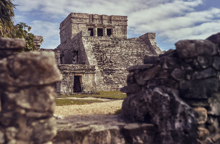 Temple of the frescos in the Mayan complex of Tulum, in Mexico taken during the sunset.の写真素材