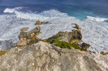 Rocks that go to the sea at Isla Mujeres in Mexicoの写真素材
