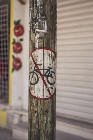 Bicycle ban road sign drawn on a wooden poleのeditorial素材
