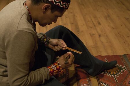 Detail of the shaman's hands as he prepares the KambÃ²: a substance extracted from the glands of a South American frog for its shamanic ceremonyのeditorial素材