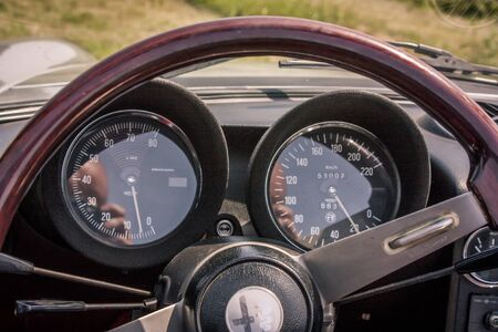 Dashboard with indicators of an Alfa Romeo GT 1300 Junior exposed to a Vintage car rallyのeditorial素材