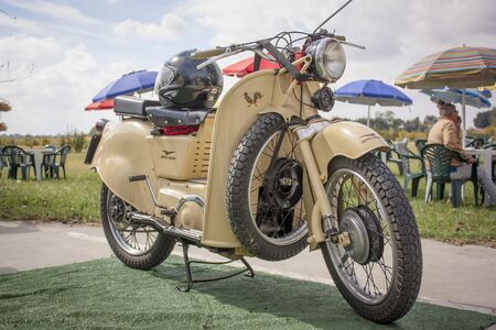 An old "Moto Guzzi" a specimen completely restored on display at a rally in the countrysideのeditorial素材