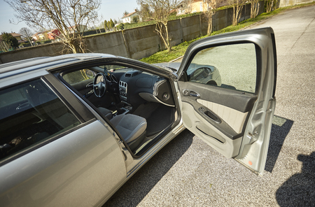 Car with the door open: first-person view of the car entranceの写真素材