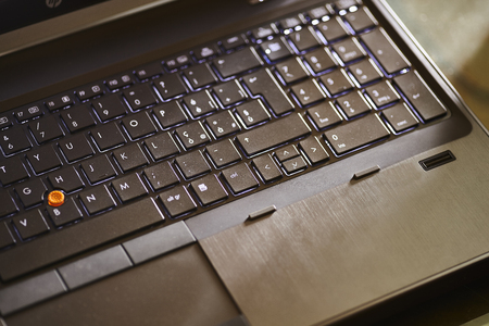 Detail of a laptop keyboard and bodyの写真素材
