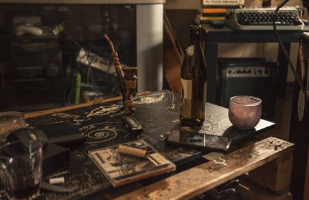 Domestic mess: bulk objects resting on a DIY tableのeditorial素材