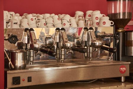 Coffee machine in a bar shelf used to make an expresso coffeeのeditorial素材